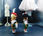 2 GERMAN DOLLS RED HATS A